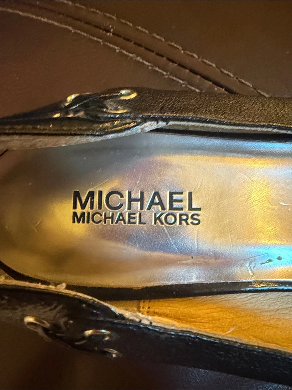Micheal Kors black flats with grommet /leather detail sz 9.5